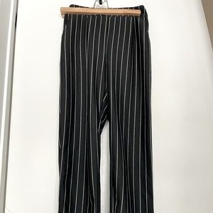 Black and white striped pants.
